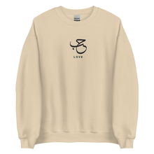 Load image into Gallery viewer, Beige unisex sweater featuring ‘Love’ embroidered in elegant Arabic calligraphy. Soft, comfortable, and stylish design perfect for everyday wear.