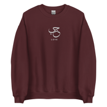 Load image into Gallery viewer, Maroon unisex sweater featuring ‘Love’ embroidered in elegant Arabic calligraphy. Soft, comfortable, and stylish design perfect for everyday wear.
