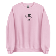 Load image into Gallery viewer, Pink unisex sweater featuring ‘Love’ embroidered in elegant Arabic calligraphy. Soft, comfortable, and stylish design perfect for everyday wear.