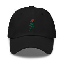 Load image into Gallery viewer, Sabr.Style classic black dad hat featuring the 'Rose of Resistance' design—an embroidered rosebud shaped like a fist, symbolizing strength and defiance. Adjustable strap and curved visor for a comfortable fit.