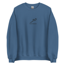 Load image into Gallery viewer, Indigo blue unisex sweater featuring ‘Patience’ embroidered in elegant Arabic calligraphy. Soft, comfortable, and stylish design perfect for everyday wear.