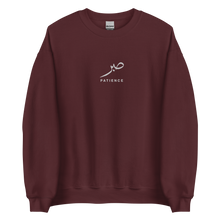 Load image into Gallery viewer, Maroon unisex sweater featuring ‘Patience’ embroidered in elegant Arabic calligraphy. Soft, comfortable, and stylish design perfect for everyday wear.