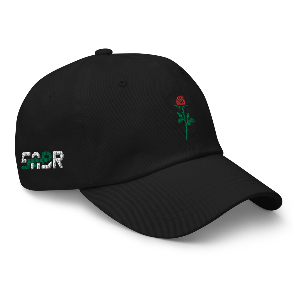 Sabr.Style classic black dad hat featuring the 'Rose of Resistance' design—an embroidered rosebud shaped like a fist, symbolizing strength and defiance. Adjustable strap and curved visor for a comfortable fit.